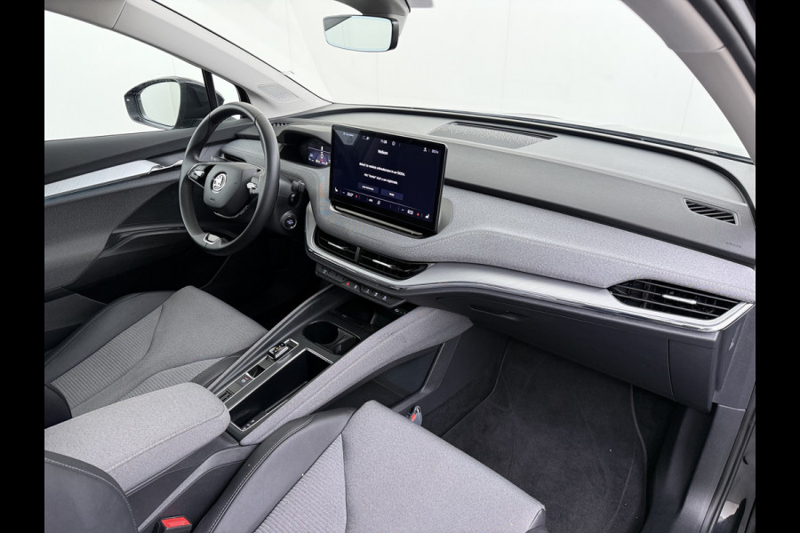 Škoda ENYAQ iV 60 SOH 92% Warmtepomp Panoramadak Adap.Cruise 3-Zone Stoelverwarming Keyless advanced Ecc Pdc Android Auto Apple Carplay Privacy Glas Lmv Led Isofix Lane Assist Verkeersbord herkenning 1e Eigenaar Dealeronderhouden Origineel Nederlandse Auto