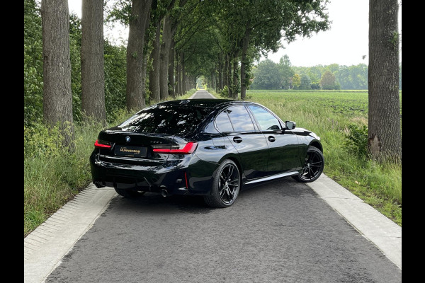 BMW 3-serie 330e M Sport | Open dak | Adapt. cruise | Trekhaak | Head-up | Stoelverwarming | Sfeerverlichting | Carplay | Leder