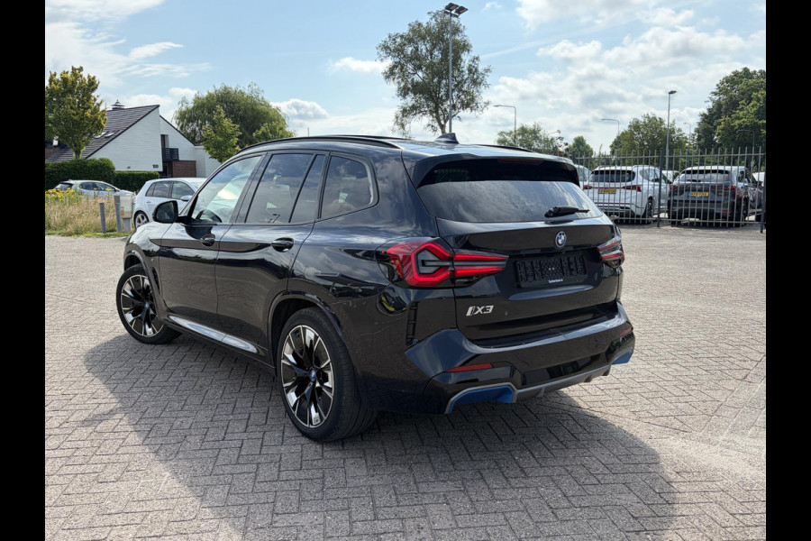 BMW iX3 High Executive 80 kWh | M Sport | Panoramadak | Trekhaak wegklapbaar | Harman/kardon | Keyless entry | Sportstoelen | Stoelverwarming | 360 graden camera | Head Up Display