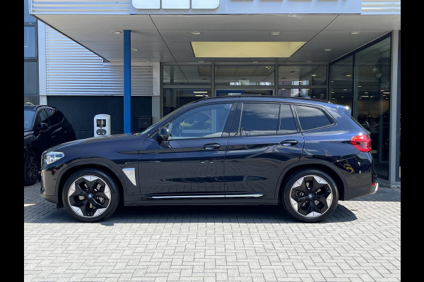 BMW iX3 High Executive 80 kWh | SOH 97,4% | Leder | Pano | Trekhaak | Harman Kardon | 360 Camera | Stoelverwarming | Adaptive Cruise