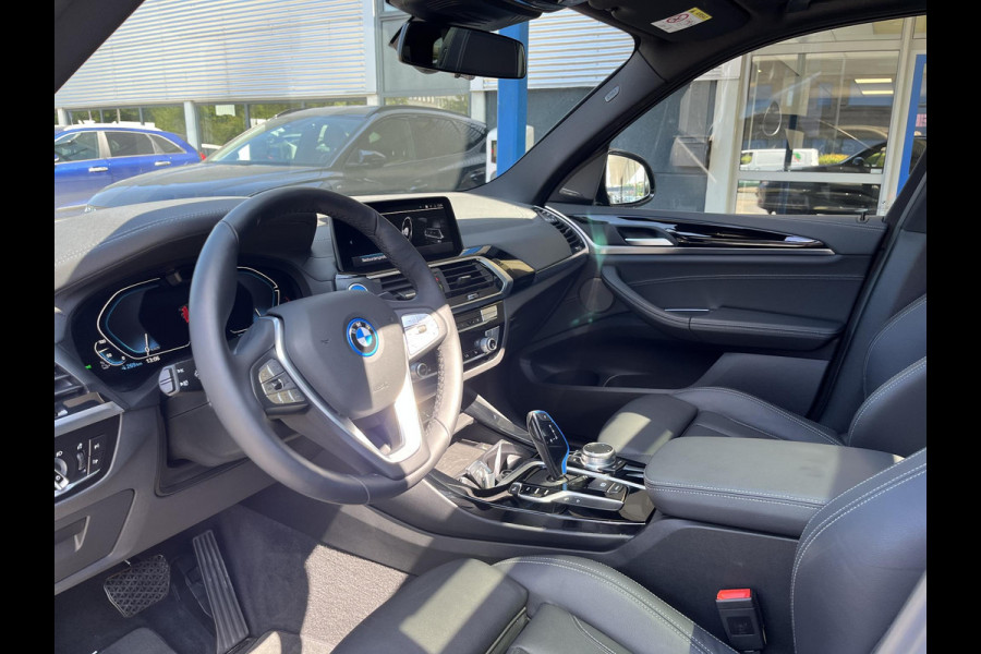 BMW iX3 High Executive 80 kWh | SOH 97,4% | Leder | Pano | Trekhaak | Harman Kardon | 360 Camera | Stoelverwarming | Adaptive Cruise