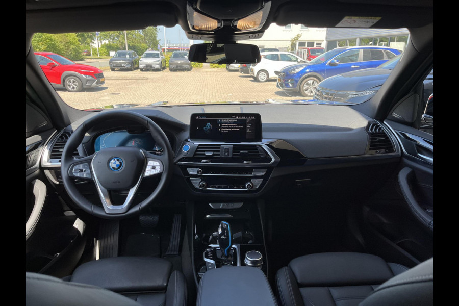 BMW iX3 High Executive 80 kWh | SOH 97,4% | Leder | Pano | Trekhaak | Harman Kardon | 360 Camera | Stoelverwarming | Adaptive Cruise