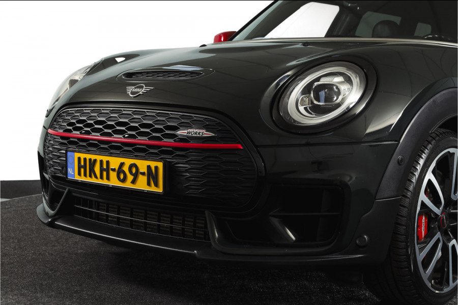 MINI Clubman 2.0 JCW ALL4 Chili | S/K-Panodak | Adapt. Cruise | Stoelverw. | PDC | Camera | NAV + App.Connect | ECC | Harman Kardon | LM 19" |