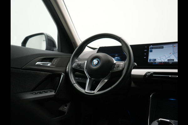 BMW iX1 xDrive30 67 kWh 313pk Dealer O.H. | Adaptief M Onderstel | Camera | Cruise Control | Stoelverwarming | Widescreen Navi | Park Assist | Apple Carplay | Navigatie | DAB | Standkachel |