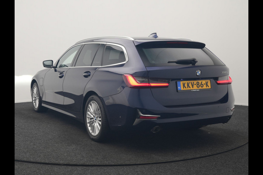 BMW 3 Serie Touring 330e Luxury Line PHEV 293pk Dealer O.H. | Trekhaak Af Fabriek | Panodak | Head Up | Adaptive Cruise | Laser LED | Camera | Lederen Comfortstoelen Verwarmd | Sfeerverlichting | Keyless | Blis | Apple Carplay | Navigatie | DAB | Plug In Hybrid |
