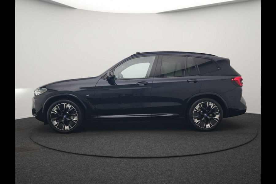 BMW iX3 M Sport High Executive 80 kWh 286pk Dealer O.H. SOH 95% | Trekhaak Af Fabriek | Panodak | Head Up | 360 Camera | Harman / Kardon | Lederen Sportstoelen Memory & Verwarmd | Keyless | Blis | Sfeerverlichting | 20"L.M | Adaptive LED |