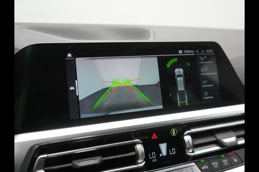 BMW 3 Serie Touring 330e Sportline PHEV 293pk Dealer O.H. | Dravitgrau | Trekhaak Af Fabriek | Adaptive Cruise | Laser LED | Head Up | Adaptief Onderstel | Camera | Sportstoelen Verwarmd | Sfeerverlichting | Keyless | Blis | Apple Carplay | 19"L.M | Plug In Hybrid |