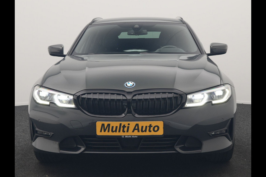 BMW 3 Serie Touring 330e Sportline PHEV 293pk Dealer O.H. | Dravitgrau | Trekhaak Af Fabriek | Adaptive Cruise | Laser LED | Head Up | Adaptief Onderstel | Camera | Sportstoelen Verwarmd | Sfeerverlichting | Keyless | Blis | Apple Carplay | 19"L.M | Plug In Hybrid |