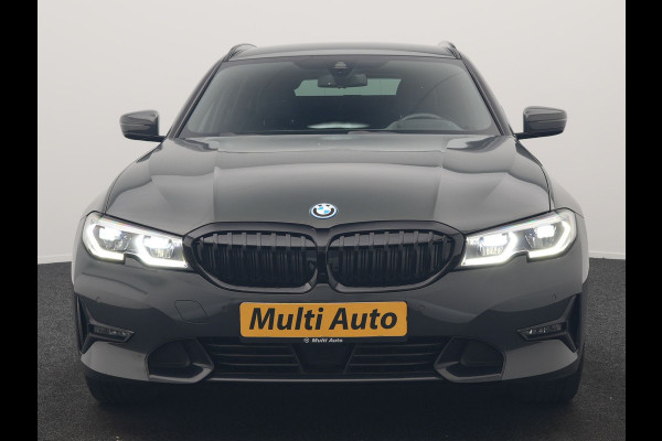 BMW 3 Serie Touring 330e Sportline PHEV 293pk Dealer O.H. | Dravitgrau | Trekhaak Af Fabriek | Adaptive Cruise | Laser LED | Head Up | Adaptief Onderstel | Camera | Sportstoelen Verwarmd | Sfeerverlichting | Keyless | Blis | Apple Carplay | 19"L.M | Plug In Hybrid |