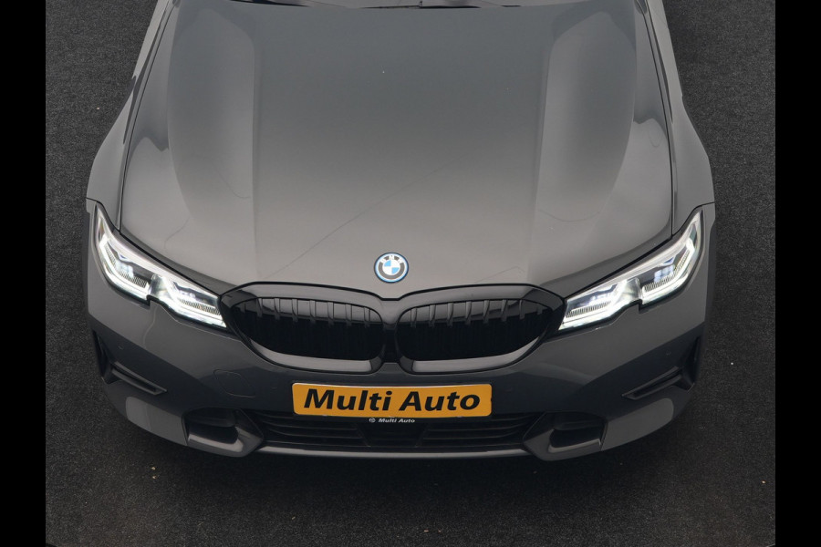 BMW 3 Serie Touring 330e Sportline PHEV 293pk Dealer O.H. | Dravitgrau | Trekhaak Af Fabriek | Adaptive Cruise | Laser LED | Head Up | Adaptief Onderstel | Camera | Sportstoelen Verwarmd | Sfeerverlichting | Keyless | Blis | Apple Carplay | 19"L.M | Plug In Hybrid |