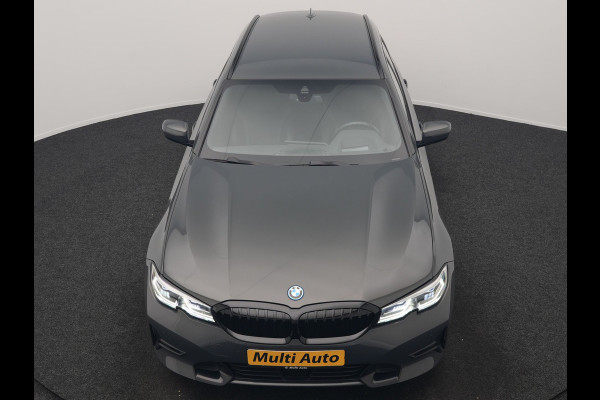 BMW 3 Serie Touring 330e Sportline PHEV 293pk Dealer O.H. | Dravitgrau | Trekhaak Af Fabriek | Adaptive Cruise | Laser LED | Head Up | Adaptief Onderstel | Camera | Sportstoelen Verwarmd | Sfeerverlichting | Keyless | Blis | Apple Carplay | 19"L.M | Plug In Hybrid |