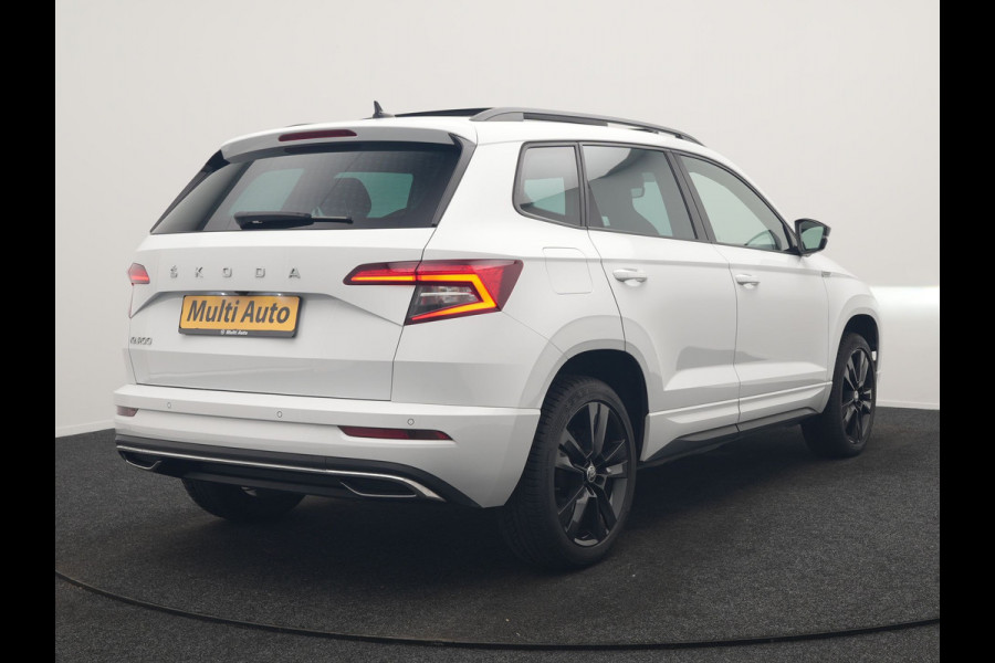 Škoda Karoq 1.5 TSI ACT Sportline DSG 150pk Dealer O.H | Panodak | Adaptive Cruise | Camera | RS Sportstoelen Verwarmd | Blis | Keyless | Apple Carplay | Black Optic | Virtual | Navigatie | DAB | 18"L.M |