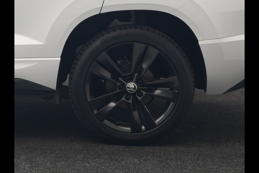 Škoda Karoq 1.5 TSI ACT Sportline DSG 150pk Dealer O.H | Panodak | Adaptive Cruise | Camera | RS Sportstoelen Verwarmd | Blis | Keyless | Apple Carplay | Black Optic | Virtual | Navigatie | DAB | 18"L.M |