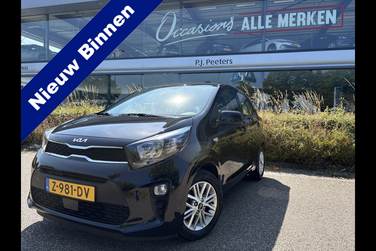 Kia Picanto 1.0 DPi DynamicLine Achteruitrijcamera - Apple carplay - Airco - Cruise control - Navigatie - Cruise control - Licht metalen velgen 14 inch - Radio - Start/stop systeem - Bluetooth - Elektrische ramen - Stuur multifunctioneel