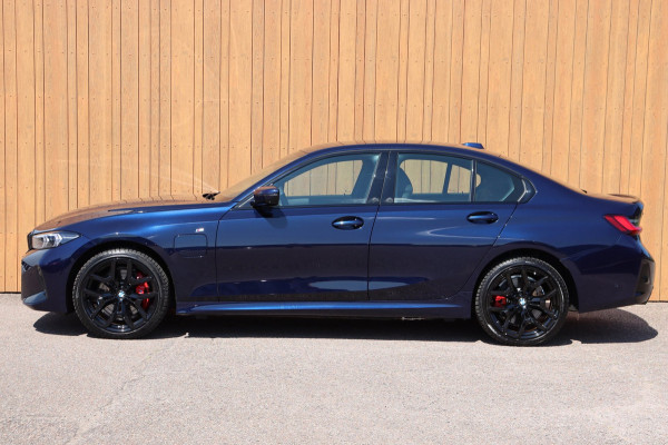 BMW 3-serie 330e xDrive Tansanitblau HUD ambiance verl M-Sport Pro leer+vw stuurverw el.klep camera's