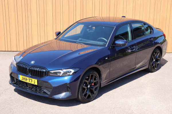 BMW 3-serie 330e xDrive Tansanitblau HUD ambiance verl M-Sport Pro leer+vw stuurverw el.klep camera's