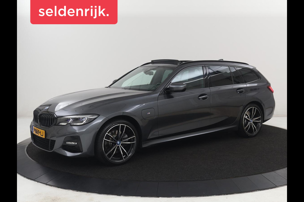 BMW 3 Serie Touring 320e Business Edition Plus M-sport | 84,4% SOH | Panoramadak | Leder | Elektrische trekhaak | Camera | Park assist | Cruise control | Carplay | Sfeerverlichting |
