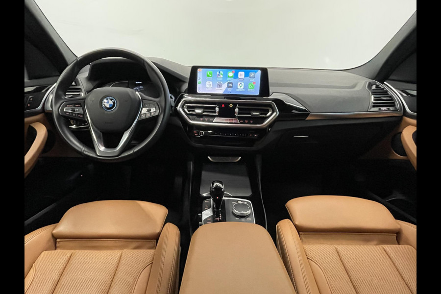 BMW X3 xDrive30e Trekhaak PDC VA + Camera Sportstoelen 19" M-Sport Stoelverwarming Cognac Leder Bekleding Privacy Glass DAB+ Navi Carplay Cruise Control