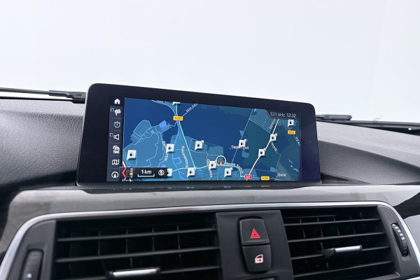 BMW 3 Serie Touring 318i High Executive (NAVIGATIE, TREKHAAK, STOELVERWARMING, DEALER ONDERHOUDEN, LEDER, LED)