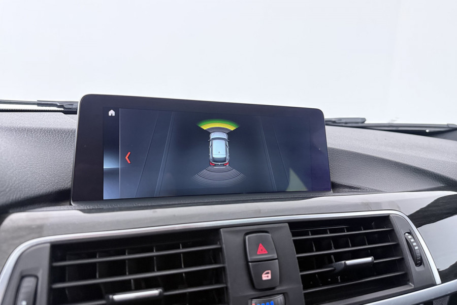 BMW 3 Serie Touring 318i High Executive (NAVIGATIE, TREKHAAK, STOELVERWARMING, DEALER ONDERHOUDEN, LEDER, LED)