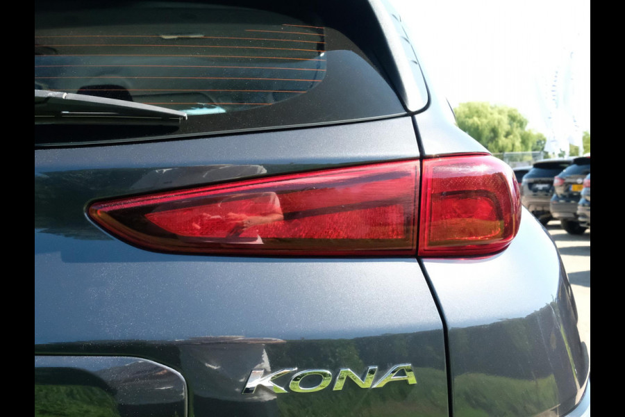 Hyundai Kona EV Fashion 64 kWh | 204 PK | SOH 95% | Adaptive cruise control | Achteruitrijcamera | Keyless entry | LED verlichting | DAB ontvanger | Bluetooth telefoonverbinding | Navigatie | Lichtmetalen velgen