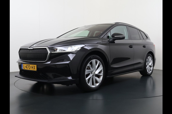 Škoda ENYAQ iV 60 Panoramadak Trekhaak Leder Adap.Cruise Stoel+Stuur+Achterbankverwarming Camera 3-Zone Ecc SOH 90% Keyless Navi Pdc Elek.Achterklep Apple Carplay Android Auto P-Assist Privacy Glas Led Lmv 20" 1.000KG Trekgewicht 1e Eigenaar Origineel Nederlandse Auto Zeer compleet