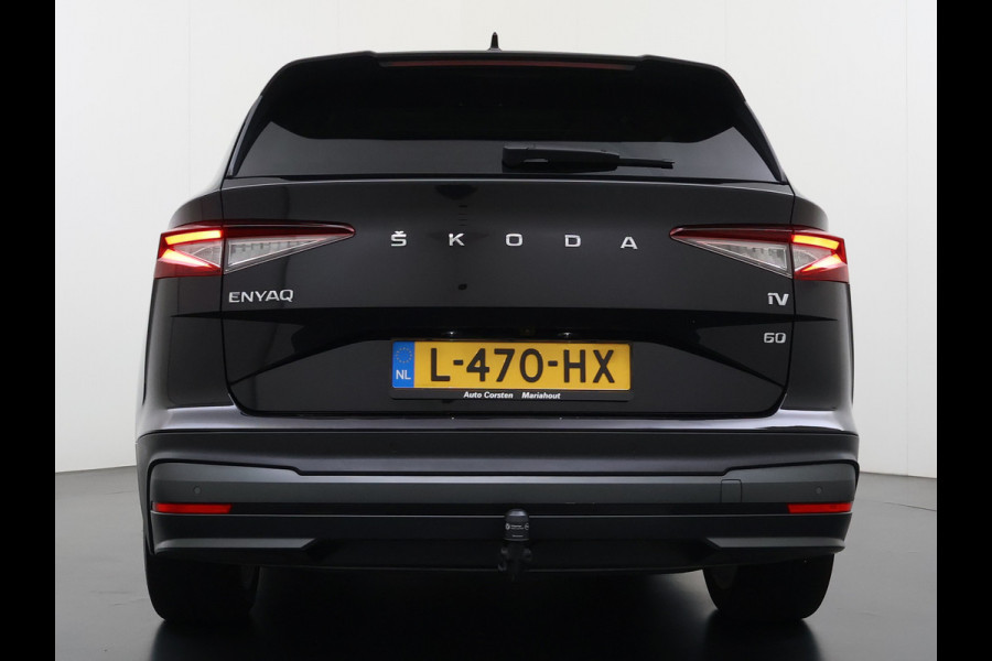 Škoda ENYAQ iV 60 Panoramadak Trekhaak Leder Adap.Cruise Stoel+Stuur+Achterbankverwarming Camera 3-Zone Ecc SOH 90% Keyless Navi Pdc Elek.Achterklep Apple Carplay Android Auto P-Assist Privacy Glas Led Lmv 20" 1.000KG Trekgewicht 1e Eigenaar Origineel Nederlandse Auto Zeer compleet