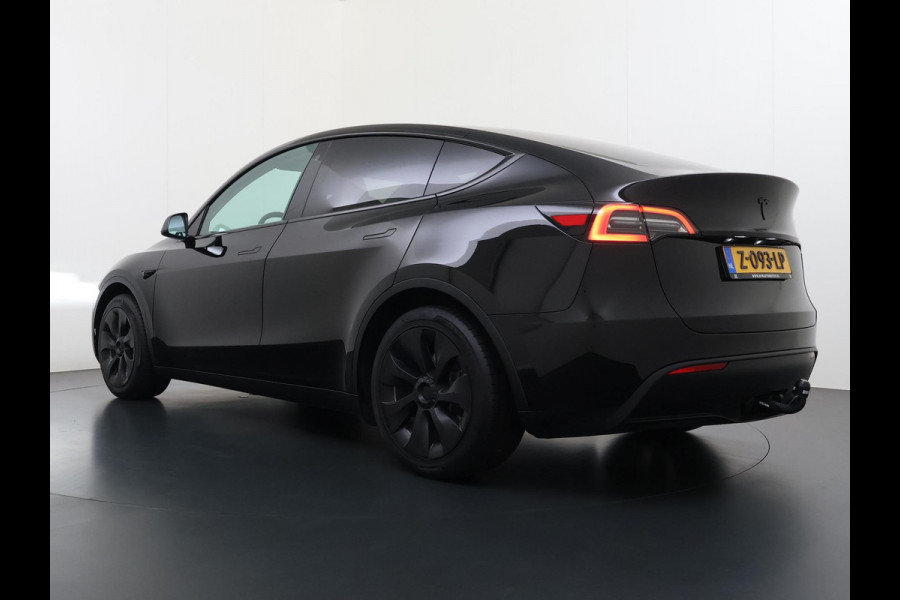 Tesla Model Y RWD 58 kWh AFNEEMBARE TREKHAAK | FABRIEKSGARANTIE OP ACCU & AANDRIJFLIJN TOT 03-2031 OF 160.000 KM | CARBON LIJSTEN |