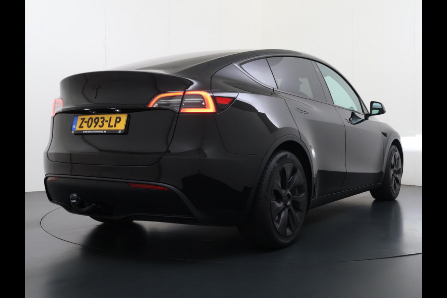 Tesla Model Y RWD 58 kWh AFNEEMBARE TREKHAAK | FABRIEKSGARANTIE OP ACCU & AANDRIJFLIJN TOT 03-2031 OF 160.000 KM | CARBON LIJSTEN |