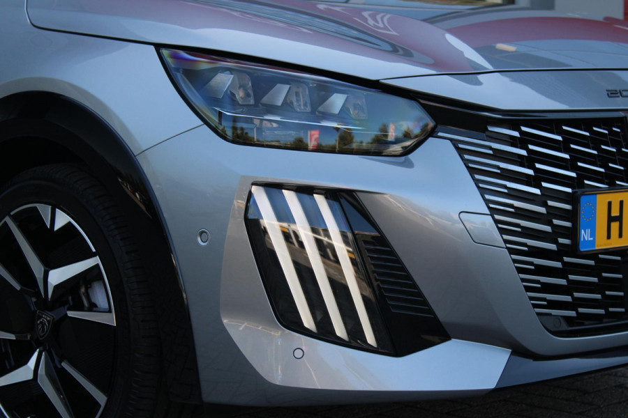 Peugeot 208 1.2 Hybrid 145PK AUTOMAAT GT | CAMERA VOOR + ACHTER | NAVIGATIE | DRAADLOZE APPLE CARPLAY/ANDROID AUTO | FULL LED KOPLAMPEN | LICHTMETALEN VELGEN 17" | DODEHOEK DETECTIE | DRAADLOZE TELEFOONLADER | KEYLESS ENTRY/START | DAB+ RADIO | ADAPTIVE CRUISE CONTROL | CLIMATE CONTROL |