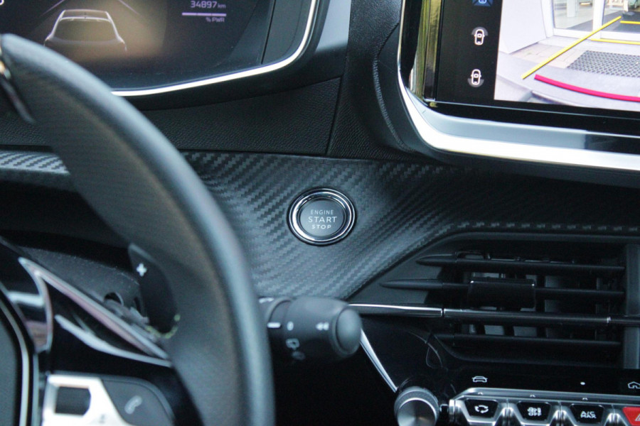 Peugeot 208 1.2 Hybrid 145PK AUTOMAAT GT | CAMERA VOOR + ACHTER | NAVIGATIE | DRAADLOZE APPLE CARPLAY/ANDROID AUTO | FULL LED KOPLAMPEN | LICHTMETALEN VELGEN 17" | DODEHOEK DETECTIE | DRAADLOZE TELEFOONLADER | KEYLESS ENTRY/START | DAB+ RADIO | ADAPTIVE CRUISE CONTROL | CLIMATE CONTROL |