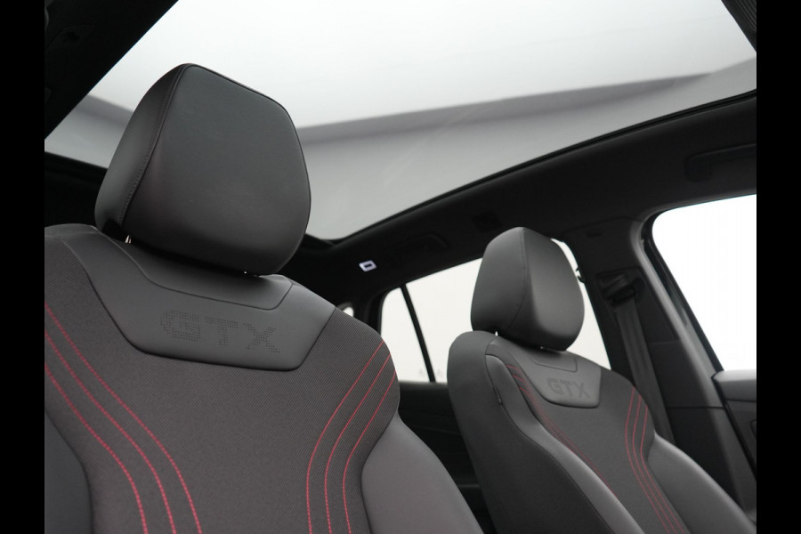 Volkswagen ID.4 GTX 4Motion 77 kWh 300pk Dealer O.H. | Trekhaak Af Fabriek | Panodak | Adaptive Cruise | IQ Light | Sportstoelen Verwarmd | Sfeerverlichting | Apple Carplay | Navigatie | DAB | 21".M | Virtual Cockpit |