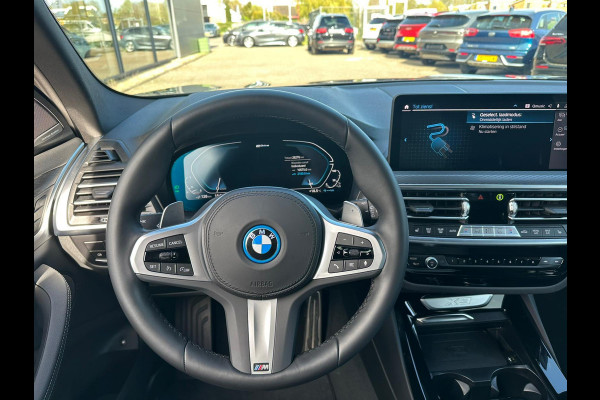 BMW X3 xDrive30e M Sport | Plug-in Hybride | incl. BMW Service Inclusive (5 jaar/100.000 km) | Afneembare Trekhaak | M pakket | Harman Kardon | Sportstoelen | Elektrische stoelen met geheugenfunctie | 360 graden camera | Stoelverwarming | Keyless | Elektrische achterklep | Adaptive Led | High-beam Headlights Control | Head Up Display | Adaptief demping systeem