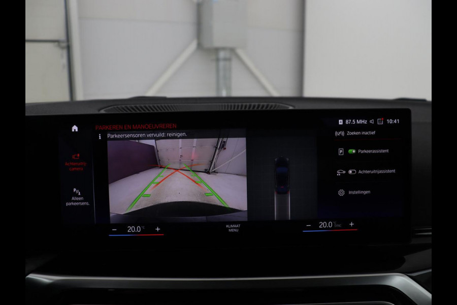 BMW i4 eDrive40 84 kWh | SOH 93,8% | Camera | Adaptive cruise | Climate control | Navigatie | DAB+ | Bluetooth | Stoelverwarming | Carplay