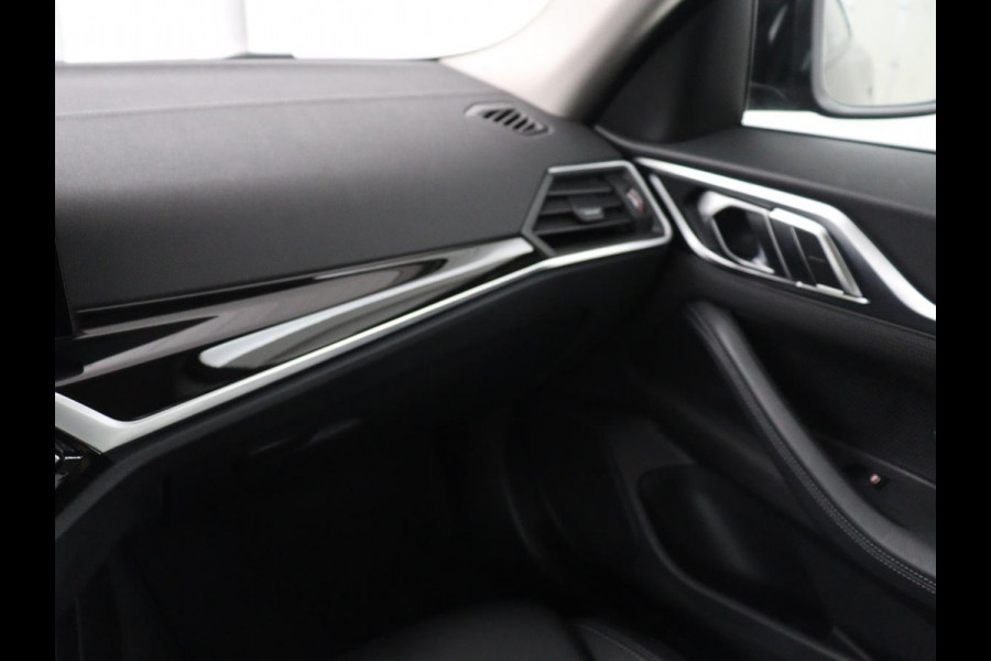 BMW i4 eDrive40 84 kWh | SOH 93,8% | Camera | Adaptive cruise | Climate control | Navigatie | DAB+ | Bluetooth | Stoelverwarming | Carplay