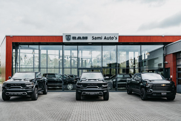 Dodge Ram GT TRX PACK | 5.7 V8 HEMI | FLAME RED | HULK PACK | LUCHTVERING | MEGA DIK | DC | DUBBLE CABINE | 5 PERSOONS | CREW CAB | GRIJS KENTEKEN | TRAIN HORN | EERSTE EIGENAAR | ORIGINEEL NEDERLANDSE AUTO | WIDE BODY | De specialist in Amerikaanse pick‑ups in Nederland en Europa.