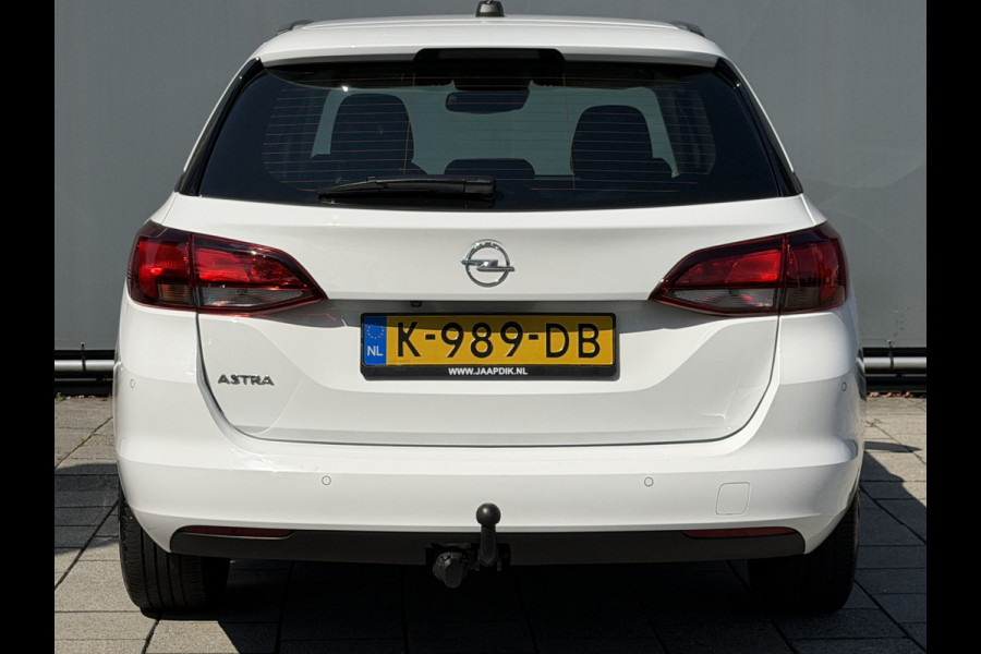 Opel Astra Sports Tourer BWJ 2020 | 1.2T 111PK EXECUTIVE TREKHAAK | CLIMA | NAVI | CARPLAY | SPORTSTOELEN | PDC 2X | CAMERA A |