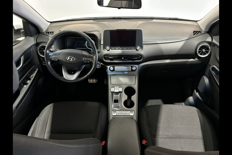 Hyundai Kona EV Comfort 39 kWh SOH 95,2% | Verwarmde stoelen | Digitaal dashboard | Warmtepomp | Navigatie