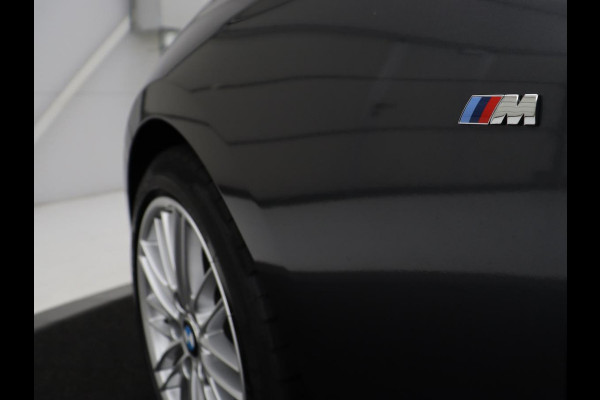 BMW 1-serie 118i High Executive M-SPORT | Leder | Full LED | Climate control | Stoelverwarming | Park assist | Cruise control | DAB | Bluetooth | Sfeerverlichting |