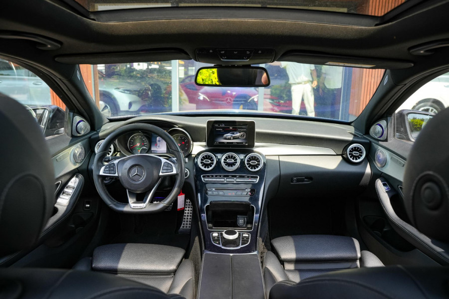 Mercedes-Benz C-Klasse 180 Business Solution AMG Panoramadak 3D Burmester Ambient Camera Stoelverwarming Leer Cruise Control