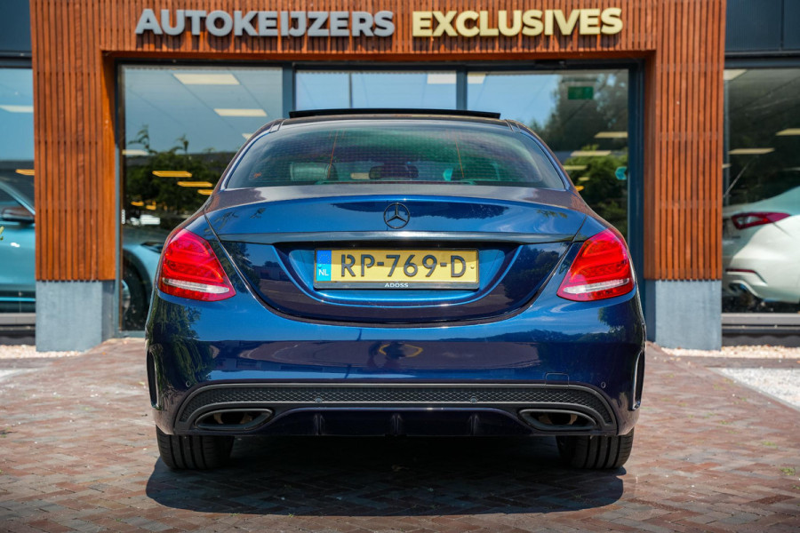 Mercedes-Benz C-Klasse 180 Business Solution AMG Panoramadak 3D Burmester Ambient Camera Stoelverwarming Leer Cruise Control
