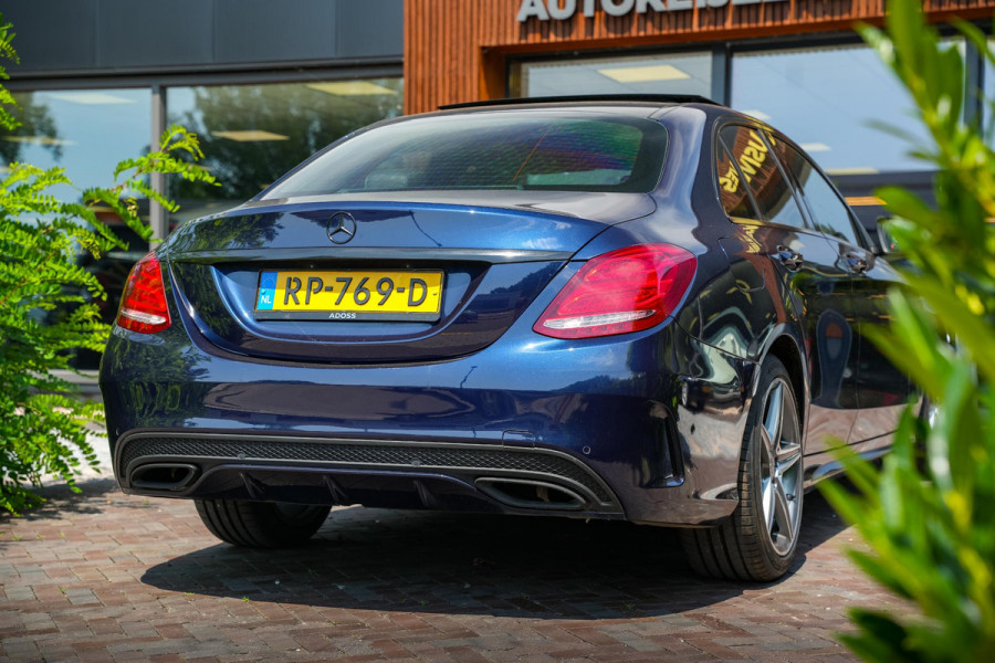 Mercedes-Benz C-Klasse 180 Business Solution AMG Panoramadak 3D Burmester Ambient Camera Stoelverwarming Leer Cruise Control