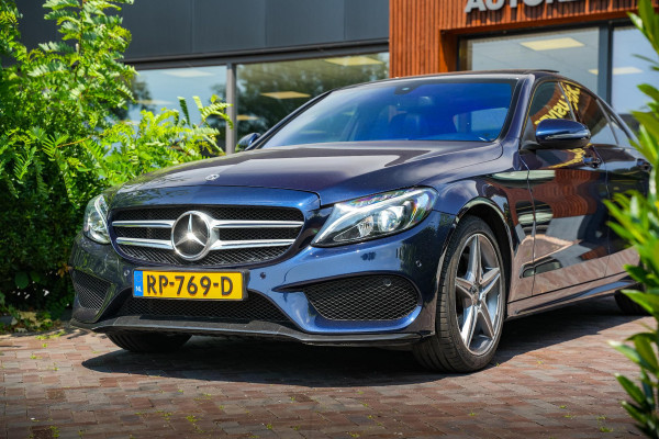 Mercedes-Benz C-Klasse 180 Business Solution AMG Panoramadak 3D Burmester Ambient Camera Stoelverwarming Leer Cruise Control