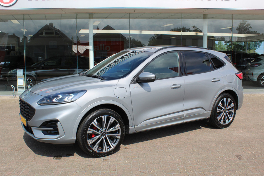 Ford Kuga 2.5 PHEV ST-Line X , 1500kg Trekgewicht , Slechts 35000km Navigatie, Stoel,stuur en voorruitverwarming, Climate control Trekhaak , Bluetooth , Head-up display , BenO audio systeem