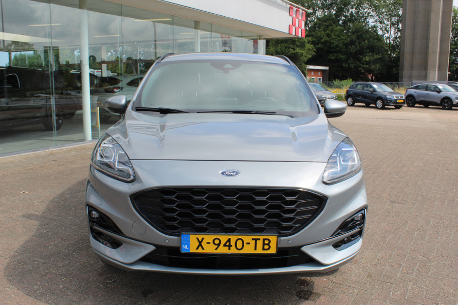 Ford Kuga 2.5 PHEV ST-Line X , 1500kg Trekgewicht , Slechts 35000km Navigatie, Stoel,stuur en voorruitverwarming, Climate control Trekhaak , Bluetooth , Head-up display , BenO audio systeem
