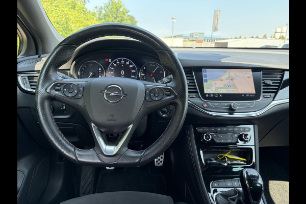 Opel Astra Sports Tourer 1.2 Ultimate 146pk,Camera,Keyless,Carplay,6 Bak,Afn Trekhaak,Stoelverw,Lm velgen,Alcantara-Leder,Dealer Onderhouden,Clima,Cruise,Dodehoek,Rijstrooksensor,N.A.P,PDc V+A,Apk tot 07-2028