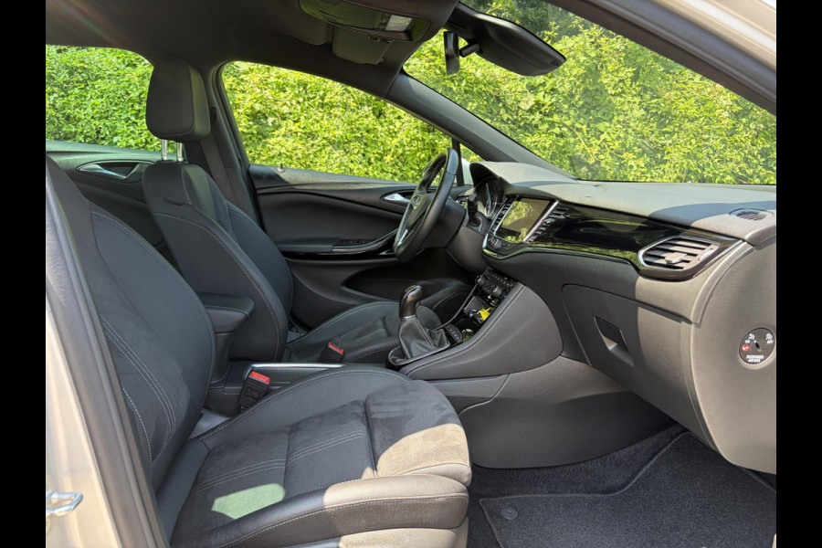 Opel Astra Sports Tourer 1.2 Ultimate 146pk,Camera,Keyless,Carplay,6 Bak,Afn Trekhaak,Stoelverw,Lm velgen,Alcantara-Leder,Dealer Onderhouden,Clima,Cruise,Dodehoek,Rijstrooksensor,N.A.P,PDc V+A,Apk tot 07-2028