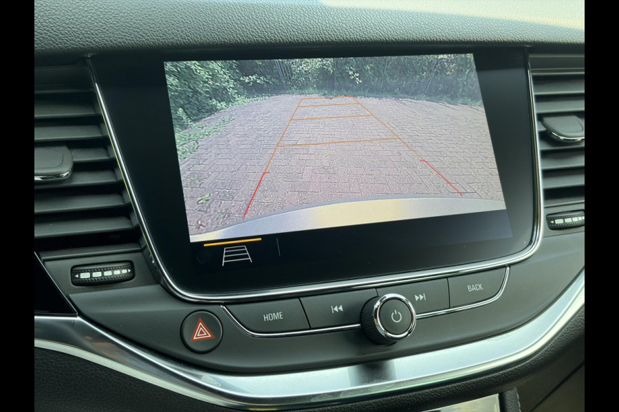 Opel Astra Sports Tourer 1.2 Ultimate 146pk,Camera,Keyless,Carplay,6 Bak,Afn Trekhaak,Stoelverw,Lm velgen,Alcantara-Leder,Dealer Onderhouden,Clima,Cruise,Dodehoek,Rijstrooksensor,N.A.P,PDc V+A,Apk tot 07-2028
