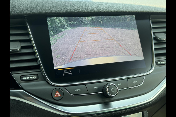 Opel Astra Sports Tourer 1.2 Ultimate 146pk,Camera,Keyless,Carplay,6 Bak,Afn Trekhaak,Stoelverw,Lm velgen,Alcantara-Leder,Dealer Onderhouden,Clima,Cruise,Dodehoek,Rijstrooksensor,N.A.P,PDc V+A,Apk tot 07-2028