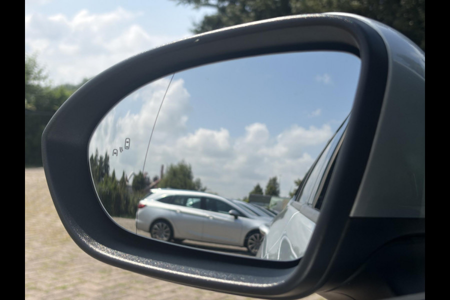 Opel Astra Sports Tourer 1.2 Ultimate 146pk,Camera,Keyless,Carplay,6 Bak,Afn Trekhaak,Stoelverw,Lm velgen,Alcantara-Leder,Dealer Onderhouden,Clima,Cruise,Dodehoek,Rijstrooksensor,N.A.P,PDc V+A,Apk tot 07-2028